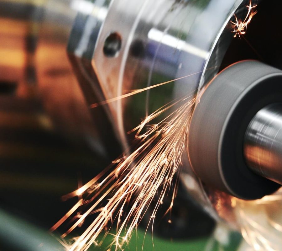 finishing-metal-working-on-high-precision-grinding-machine-in-workshop-1.jpg